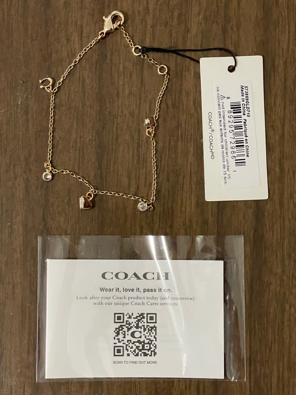 Coach Gold-Tone Heart & Crystal Charm Bracelet